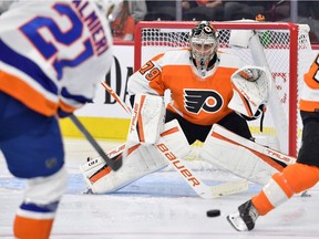 New York Islanders right wing Kyle Palmieri (21) shoots the puck at Philadelphia Flyers goaltender Carter Hart (79) during the first period at Wells Fargo Center in September.