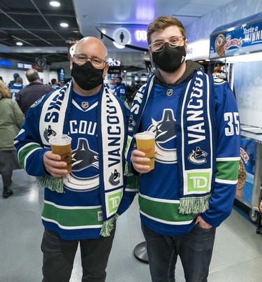 Oct 26, 2021; Vancouver, British Columbia, CAN; Fans stream back into Rogers Arena for the home opener of the Vancouver Canucks Season in a game against he Minnesota Wild.  This will be the first time the Canucks have been allowed a 100 percent capacity crowd in 18 months due to Covid 19 restrictions.  Mandatory Credit: Bob Frid-USA TODAY Sports
