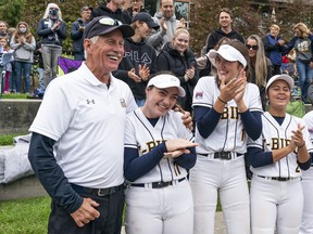 Coach Gord Collings and his UBC Thunderbirds on Saturday at the inaugural game at Cowlings Field.