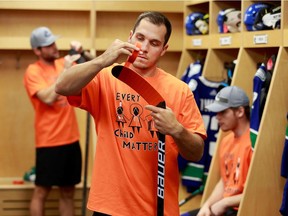 A handout photograph of Bo Horvat wearing an Every Child Matters T- shirt before the game on Sep. 27.