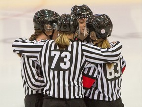 Referees Grace Barlow and Megan Howes, with lineswomen Melissa Brunn and Colleen Geddes, officiate a BCHL Junior A game between the Langley Rivermen and the Surrey Eagles at South Surrey Arena on Oct. 17.