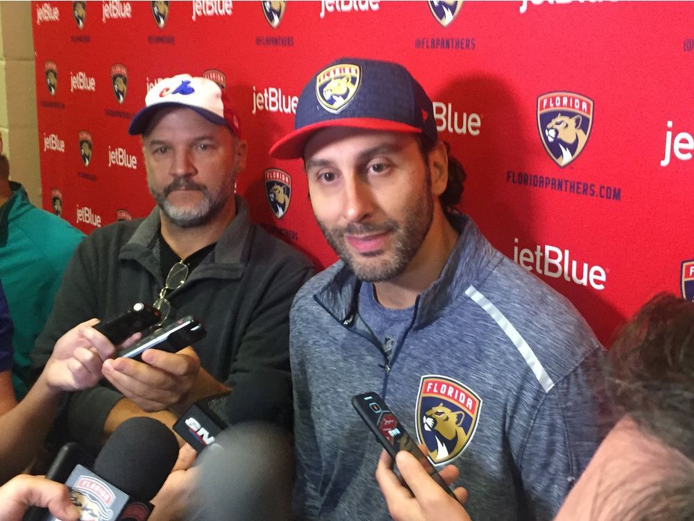  Florida Panthers netminder Roberto Luongo talks to the media Saturday before the pregame ceremony honouring him for playing 1,000 games in the NHL. The former Canuck is the third goaltender in NHL history to play in 1,000 games. [PNG Merlin Archive]