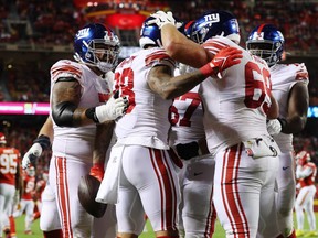 The New York Giants celebrate after teammate Evan Engram #88 scores a touchdown during the second half against the Kansas City Chiefs at Arrowhead Stadium on Nov. 1, 2021 in Kansas City, Miss.