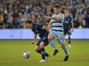 Vancouver Whitecaps goalkeeper Maxime Crepeau gives up a goal to Sporting Kansas City forward Khiry Shelton (not pictured) during the first half in a Round 1 MLS Playoff game at Children's Mercy Park.