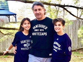 Scott Weinberg with his daughter, Elin (left) and son David Weinberg, 14. A Metro Vancouver native, Weinberg lives in Kansas City but remains a huge Whitecaps and soccer fan, as is David, who plays in the U.S. Olympic Development Program.