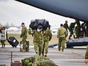 Members of the Canadian Armed Forces have arrived in Abbotsford to assist with flood recovery. Credit: Dale Klippenstein, Canadian Armed Forces