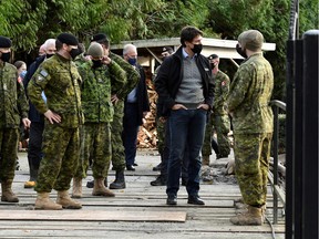 Canada's Prime Minister Justin Trudeau visits Abbottsford after rainstorms lashed the western Canadian province of British Columbia, triggering landslides and floods, shutting highways, in Abbottsford, British Columbia, Canada November 26, 2021.