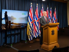 Premier John Horgan makes an announcement about CleanBC plans last month.