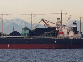 Bulk carriers are filled with coal for export at Roberts Bank Superport in Delta in this file photo from Jan. 15, 2018.