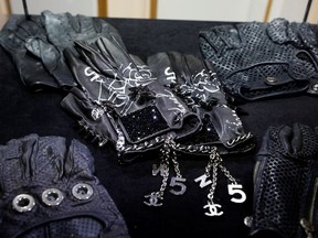 Chanel pairs of gloves are displayed before the auction of late fashion designer Karl LagerfeldÕs Collection by Sotheby's auction house in Monte-Carlo, Monaco, November 30, 2021.