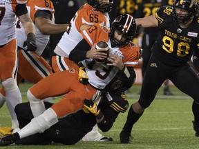 CP-Web. BC Lions quarterback Michael Reilly is sacked by Hamilton Tiger Cats defensive end Julian Howsare (95) during first half CFL football game action in Hamilton, Ont. on Friday, November 5, 2021.