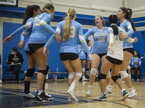 Seaquam senior girls volleyball team celebrates a point during a match against Semiahmoo from a tournament at Seaquam earlier this year.