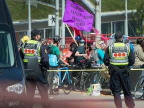 Extinction Rebellion, a global environmental movement, occupies the Granville Bridge in Vancouver, BC, May 2, 2021.