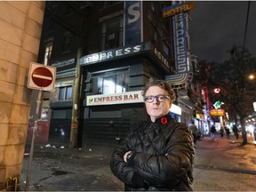 Christopher Wall outside the Hotel Empress, one of several SROs he owns in Vancouver.