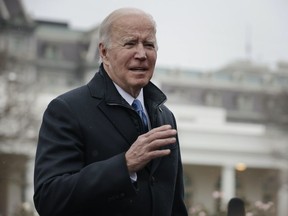 U.S. President Joe Biden stops to talk to reporters before departing the White House December 08, 2021 in Washington, DC.