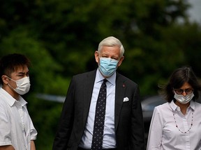 Canadian Ambassador Dominic Barton arrives at the detention centre where Canadian businessman Michael Spavor was being held in Dandong, China, in a file photo from Aug. 11, 2021.