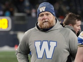 Head coach Mike O'Shea walks off the field last week. Winnipeg will meet the Ticats today in the 108th CFL Grey Cup game