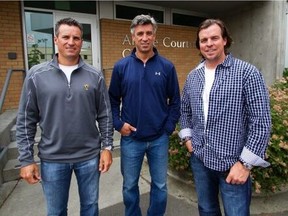 Bruce Courtnall, Geoff Courtnall and Russ Courtnall, left to right, outside of the Archie Courtnall Centre in Victoria.