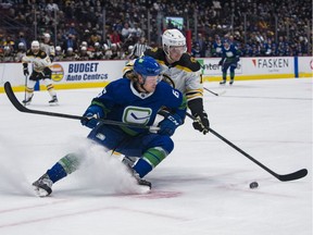 Canucks' Brock Boeser, pictured, and Phil Di Giuseppe, as well as an unnamed team employee, are isolating at the team's hotel in Anaheim, a team spokesperson confirmed.