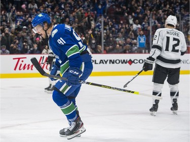 Dec 6, 2021; Vancouver, British Columbia, CAN; Vancouver Canucks forward Juho Lammikko (91) celebrates his first goal as a Canucks against the Los Angeles Kings in the third period at Rogers Arena. Vancouver won 4-0. Mandatory Credit: Bob Frid-USA TODAY Sports