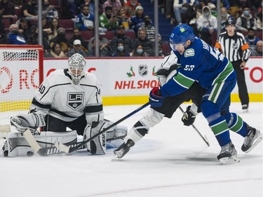 Dec 6, 2021; Vancouver, British Columbia, CAN; Los Angeles Kings goalie Cal Petersen (40) makes a save on Vancouver Canucks forward Bo Horvat (53) in the first period at Rogers Arena. Mandatory Credit: Bob Frid-USA TODAY Sports