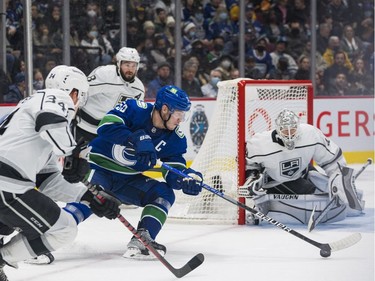 Dec 6, 2021; Vancouver, British Columbia, CAN; Vancouver Canucks forward Bo Horvat (53) drives towards Los Angeles Kings goalie Cal Petersen (40) in the second period at Rogers Arena. Mandatory Credit: Bob Frid-USA TODAY Sports