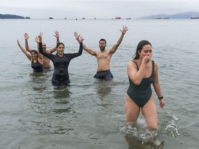 A few hardy souls ventured into English Bay on Jan. 1, 2021, despite the official event being held online due to the pandemic. There will likely be few takers this year as an Arctic front lingers.