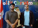 Brothers Delawar Pasoon, left, and Khan Samindar worked as interpreters for the Canadian Armed Forces in Afghanistan. Pasoon has just recently moved to Canada and his spending his first Christmas in Surrey with his wife and two-year-old daughter.