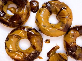 Healthy Chocolate Peanut Butter Banana Doughnuts.