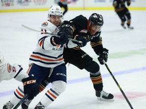 Giants captain Justin Sourdif (right) was dealt to the Edmonton Oil Kings at the WHL trade deadline.