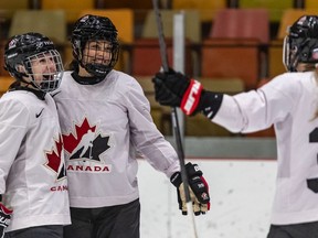 The Canadian National women's hockey team played an exhibition game against CEGEP Andre Laurendeau men's team at CEPSUM Arena in Montreal on Monday November 25, 2019. Team Canada Rebecca Johnston, centre, is congratulated on her goal by teammates Jocelyn Laroque, left, and Natalie Spooner during 2nd period exhibition action.