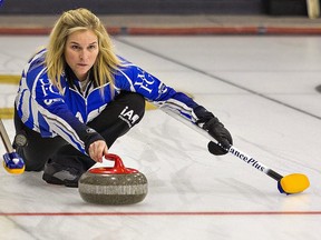 Jennifer Jones makes a delivery during the Cooper Equipment Mixed Doubles Curling Classic on Dec. 10, 2021 at the Brant Curling Club in Brantford, Ont.
