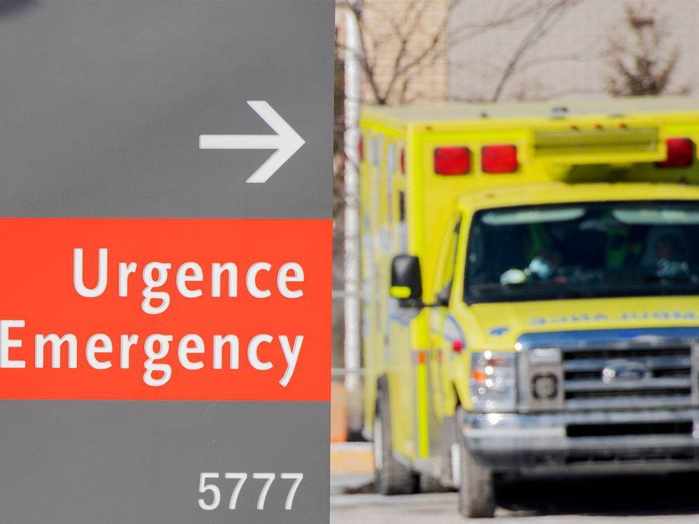 An ambulance is shown outside a hospital in Montreal, Saturday, January 15, 2022, as the COVID-19 pandemic continues in Canada