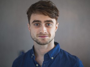 Daniel Radcliffe poses for a photo in Toronto on July 23, 2014.