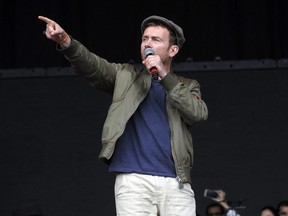 Former Blur frontman Damon Albarn performs with the Orchestra Of Syrian Musicians to open the Pyramid Stage at the Glastonbury Festival of Music and Performing Arts near the village of Pilton in Somerset, southwest England, June 24, 2016.