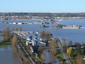 File photo: This Nov. 16, 2021 aerial handout image from the City of Abbotsford shows flooding on the Sumas Prairie in Abbotsford.