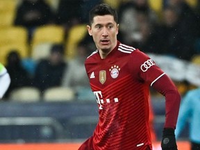 In this file photo taken on November 23, 2021 Bayern Munich's Polish forward Robert Lewandowski controls the ball during the UEFA Champions League football match between Dynamo Kiev and Bayern Munich at the Olympic Stadium in Kiev on November 23, 2021.