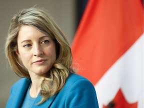 Canadian Foreign Minister Melanie Joly looks on during a news conference with High Representative of the European Union for Foreign Affairs.
