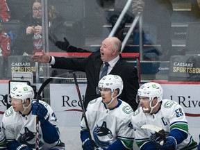 Canucks head coach Bruce Boudreau, making a point during Sunday’s win in Washington against the Capitals, says his club must keep things simple and shoot the puck more often on the power play.