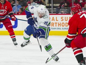 Vancouver Canucks left-winger Tanner Pearson takes a shot in the slot against the Carolina Hurricanes during the second period at the PNC Arena on Saturday.