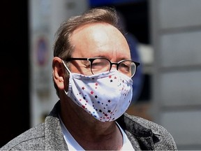 Actor Kevin Spacey walks down Carlo Alberto street as he visits the city, where he is expected to return for a cameo appearance in a low budget Italian film, after largely disappearing from public view, in Turin, Italy, June 1, 2021.