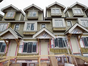 Housing under construction on East Broadway at St. Catherines in Vancouver, B.C., April 17, 2017.