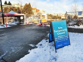 The empty lot and temporary closure sign at the St Vincent drive-in COVID-19 testing site in Vancouver, BC., December 29, 2021.
