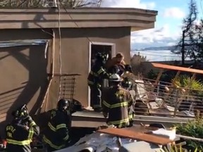 James and Didi Fritts were reunited with their dog Sammy six days after their pet was trapped inside their home following a mudslide in Seattle.