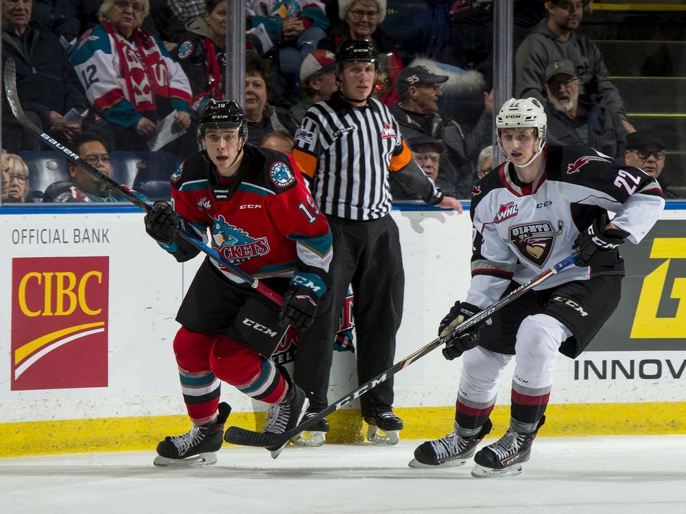 Connor Horning (right, keeping then-Kelowna Rocket Ethan Ernst in check during a December 2019 WHL game at Kelowna’s Prospera Place) is one of three 20 year olds on the Vancouver Giants. ‘That first skate back for me was hard,’ Horning says.