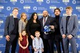 New York Giants head coach Brian Daboll (centre) poses with his family.