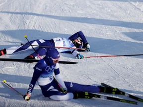 Krista Parmakoski of Team Finland collapses on the snow after the Women's Cross Country 7.5km + 7.5km Skiathlon on Day 1 of the Beijing 2022 Winter Olympic Games at The National Cross-Country Skiing Centre on February 05, 2022 in Zhangjiakou, China. (Photo by )