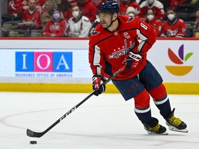 Washington Capitals left wing Alex Ovechkin handles the puck against the Ottawa Senators during the first period at Capital One Arena in Washington, D.C., Feb. 13, 2022.