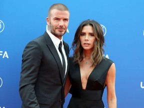 Former English football player David Beckham and his wife Victoria arrive to attend the draw for UEFA Champions League football tournament at The Grimaldi Forum in Monaco on Aug. 30, 2018.