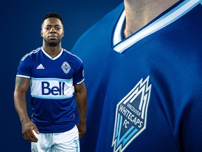 Vancouver Whitecaps forward Cristian Dajome shows off the team's new jersey.